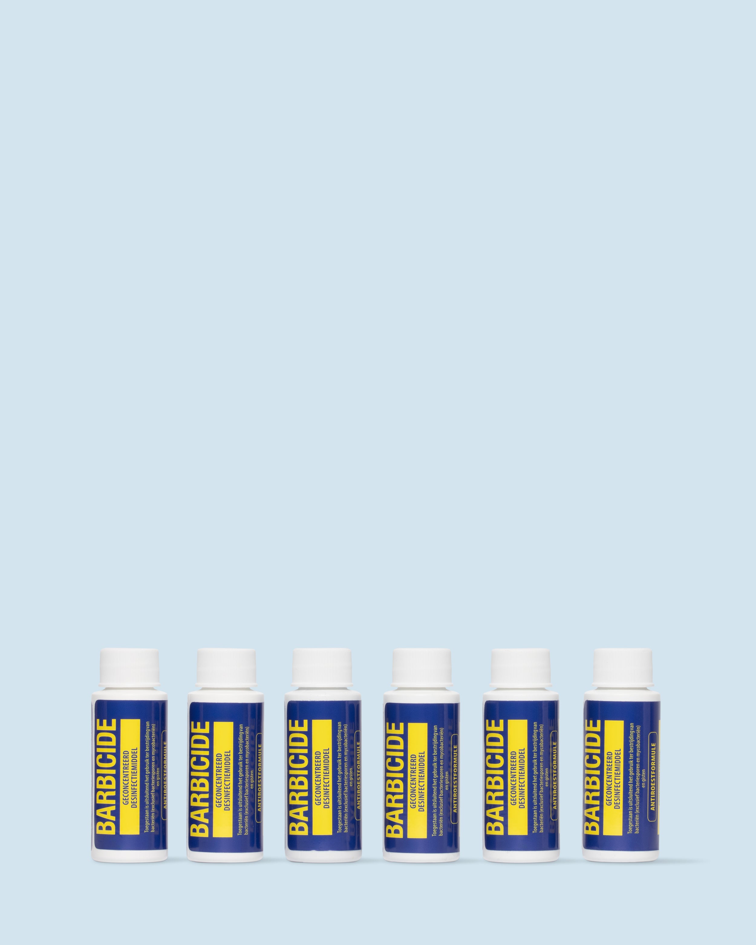 Barbicide desinfectiebullets 6×60 ml – geconcentreerde desinfectiecapsules voor professionele reiniging van tools en salonmateriaal.