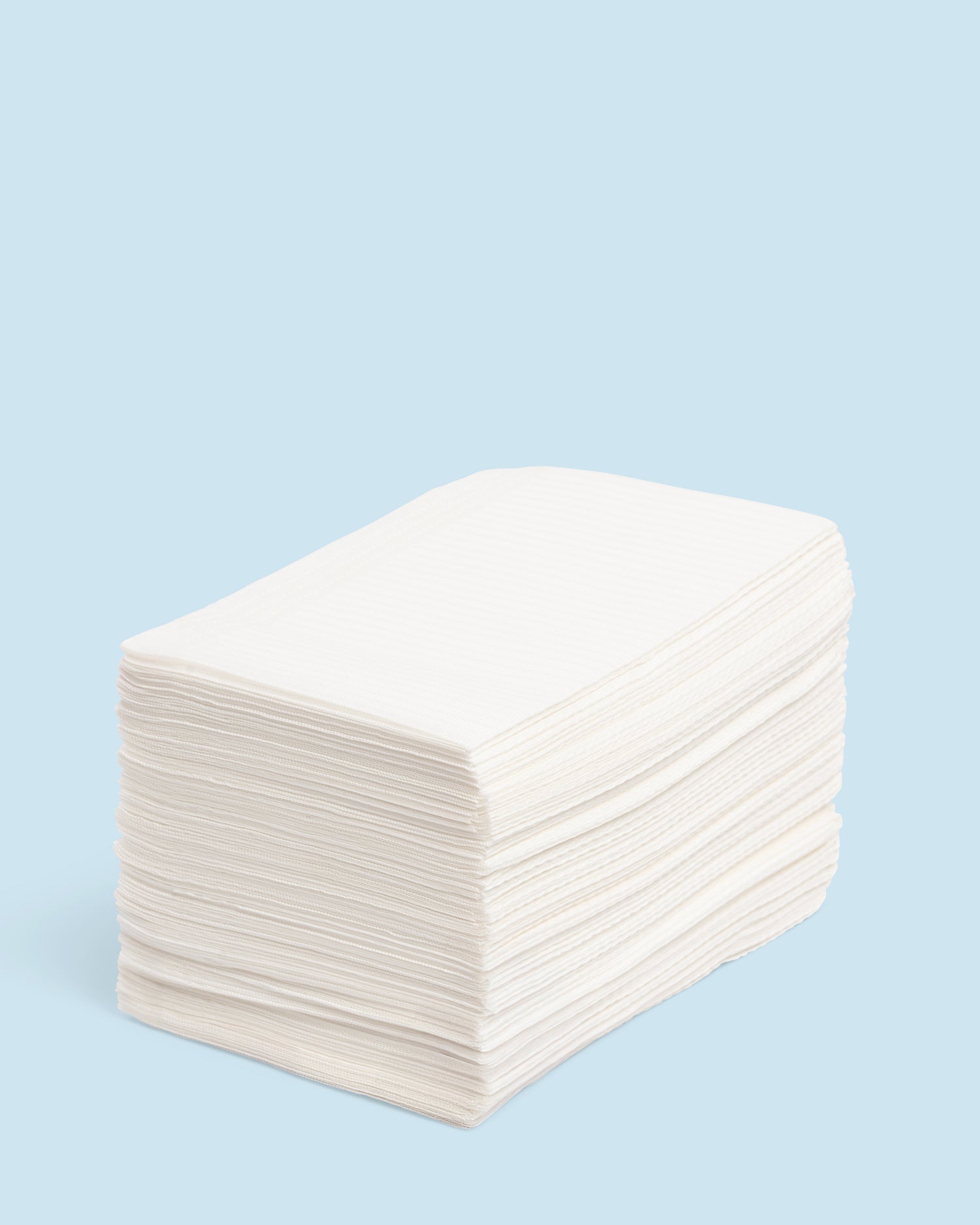 Table towels ‘White’ 125 st – sterke witte wegwerpdoekjes voor salongebruik en hygiënische werkoppervlakken.