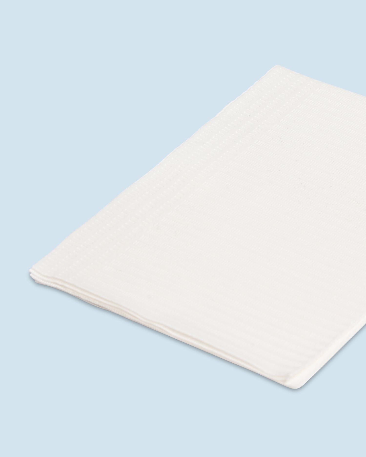 Table towels ‘White’ 125 st – sterke witte wegwerpdoekjes voor salongebruik en hygiënische werkoppervlakken.